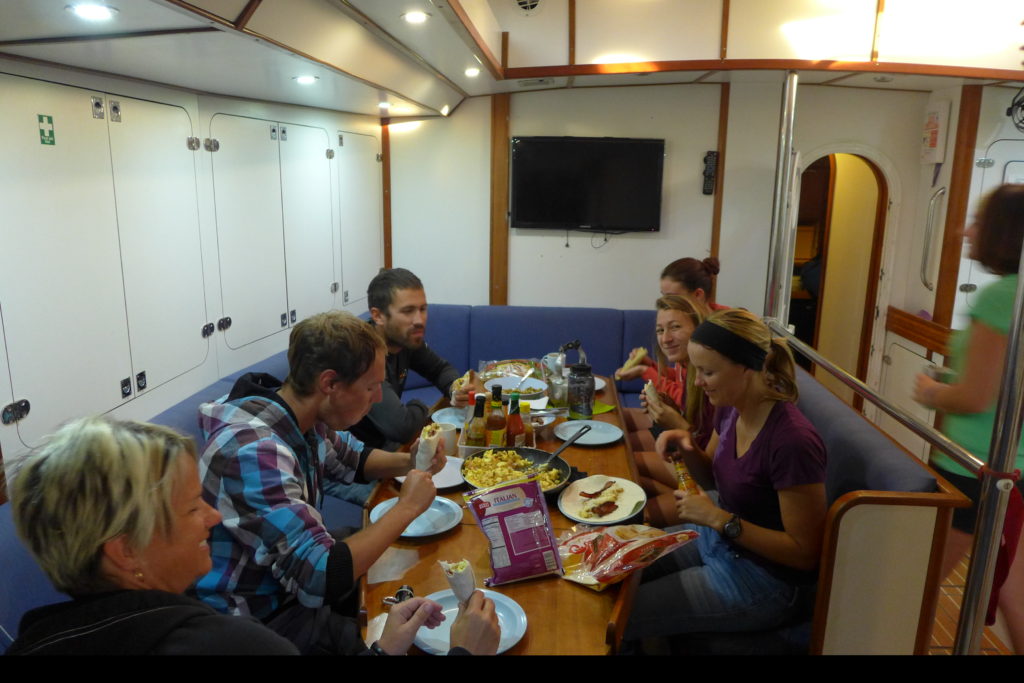 Breakfast aboard the Sea Dragon. Maddie, second from the front on the right.